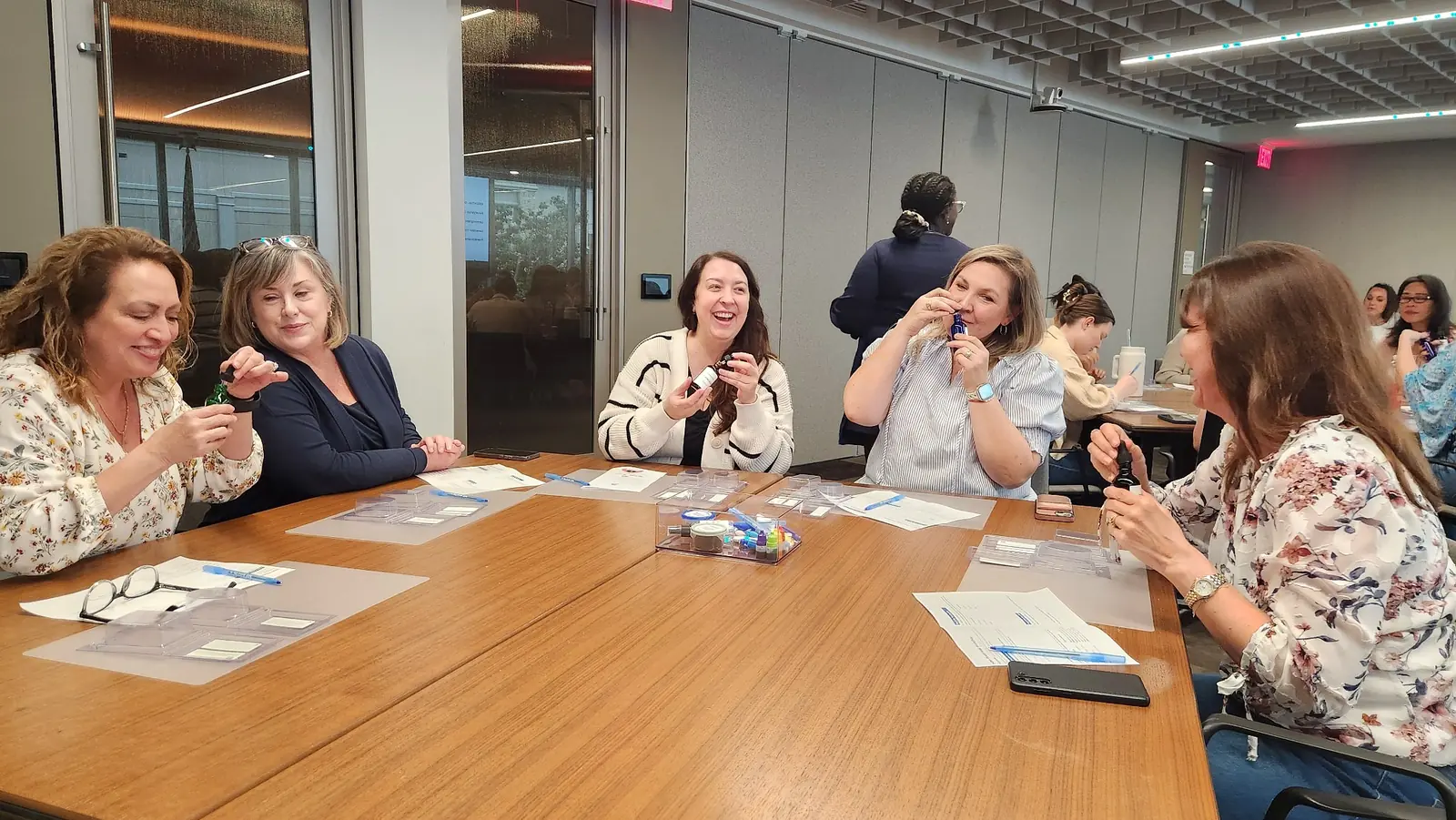 Occasion Image: Employee Appreciation Houston employees smiling during a soapmaking appreciation workshop