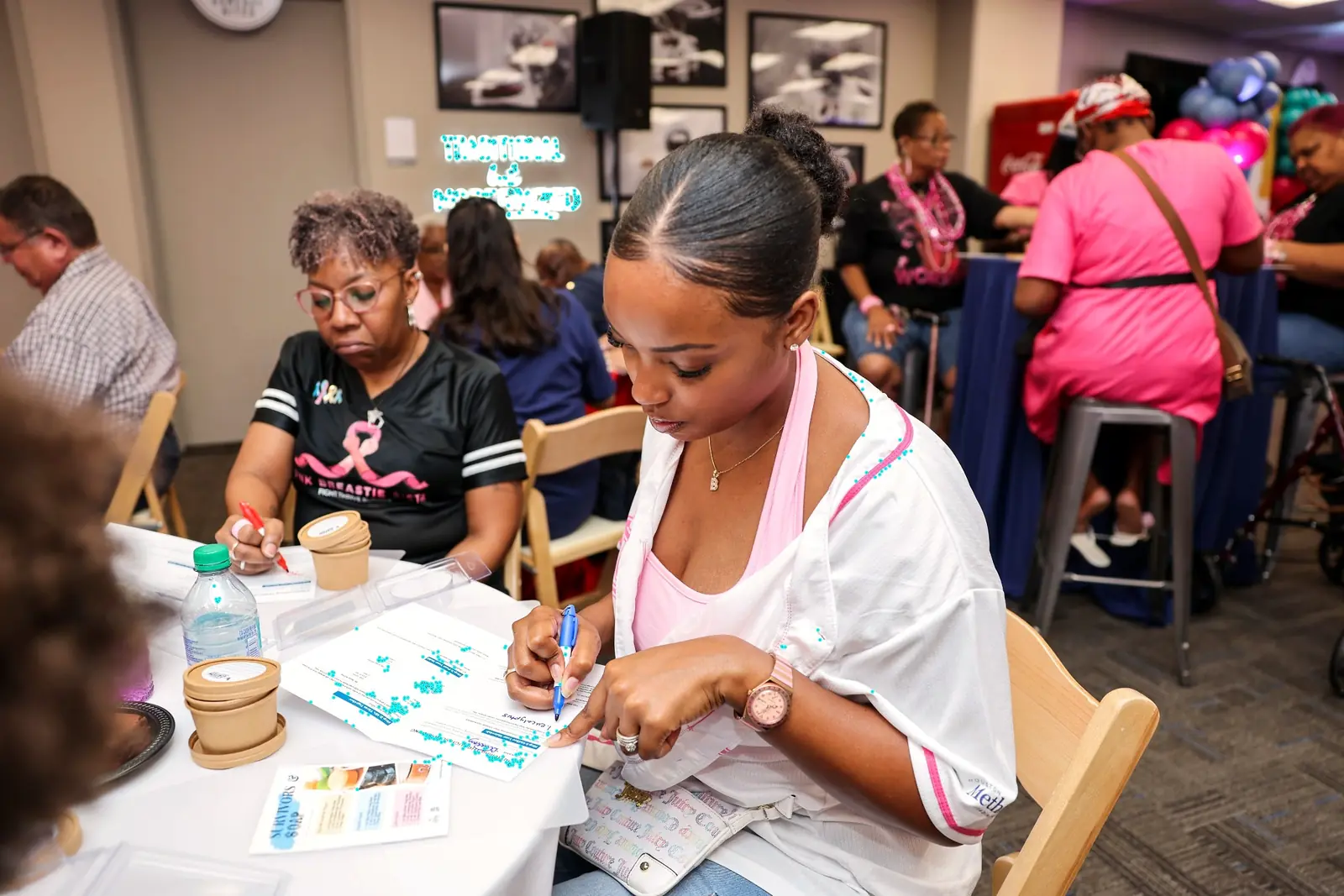 Evidence Image: Career reflection gives the making process a useful workplace purpose. Participant completing a career reflection worksheet during a Houston corporate soapmaking workshop
